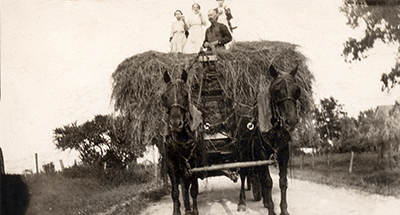 Good, dependable roads were a lifeline for farm families like the Metz’s, pictured here on Willow Road around 1915. Northfield Township was the only government agency fixing the primitive muddy roads and swampland they had to navigate.