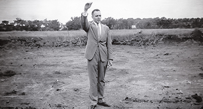 The Reverend Bruce Roberts, blessing the ground for the building of Northfield Community Church on five acres on the northwest corner of Willow and Wagner roads.