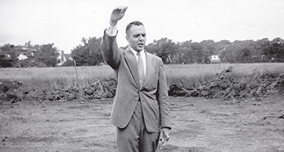 The Reverend Bruce Roberts, blessing the ground for the building of Northfield Community Church on five acres on the northwest corner of Willow and Wagner roads.