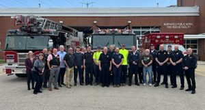 Retired firefighter and Village Trustee Charles Orth (sixth from left) with members of Northfield’s Fire, Police and Public Works departments at the retirement in April 2026 of Ken Borre who served as a Northfield firefighter/paramedic for 20 years.
