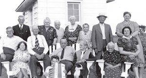 Colette Selzer (top right, standing) lived through the 1960’s in a huge turn-or-the- century farmhouse with a dirt-floor basement, just north of the Shell gas station. Her home was surrounded by a forest of huge elms and two-story-high lilac bushes. Behind it was a small, falling-down barn with chickens, ducks, a pony and an evil-tempered horse.